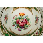 Porcelain service decorated in polychrome with floral motifs, birds, reserves, and green borders with gilding. Coalport, Broadway Green, 20th century.