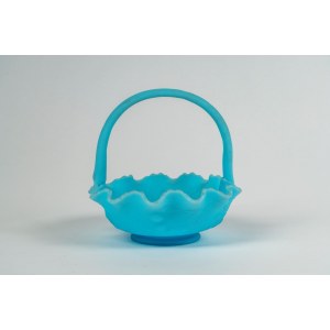 Fenton round basket in blue satin glass with arched handle and wavy edge decorated in relief with leaves and fruit, 70s-80s