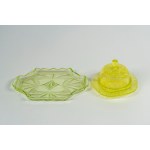 Lot consisting of a wavy-shaped tray with two handles and a butter dish with a lid, both made of uranium-green glass