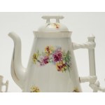 A Ginori coffee set consisting of twelve cups and saucers, a coffee pot, a sugar bowl, and a milk jug.