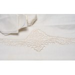 Elegant rectangular tablecloth with twelve matching linen napkins