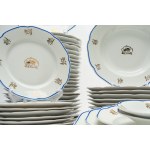 White porcelain set with a wavy edge outlined in blue and gold floral motifs. Richard Ginori, 1940s-1950s.