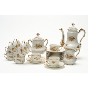 Tea set with gold handles and trim, made of white porcelain and decorated with red flowers. M. Redon, Limoges.