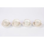 Four white and gold porcelain coffee cups with saucers, Ginori