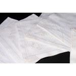 Square tablecloth made of Flanders cotton, with six napkins featuring embroidered initials MS