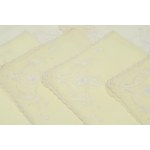 American-style service for six in hand-embroidered organza, consisting of six placemats with six matching napkins with a similar embroidered motif at the corners