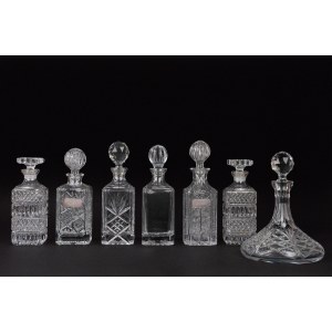Six bottles and a decanter made of Bohemian crystal
