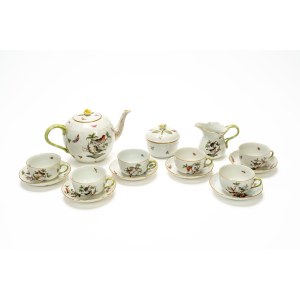 Porcelain tea set with gold trim and butterfly and bird decoration. Herend Hungary.