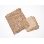 Rectangular Burano lace tablecloth featuring rich floral motifs on a mesh background. Includes twelve napkins.