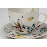 A set of Oriental porcelain consisting of two cups with saucers and a soup spoon