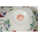 A set of Oriental porcelain consisting of two cups with saucers and a soup spoon