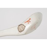A set of Oriental porcelain consisting of two cups with saucers and a soup spoon