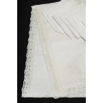 Tablecloth embroidered with inlaid flowers, featuring sheer organdy inserts and a lace border, with 12 napkins