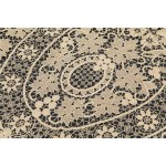 A richly decorated rectangular tablecloth featuring floral motifs in linen and lace, with twelve matching napkins