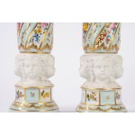 Pair of porcelain vases with biscuit-colored cherub heads
