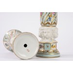 Pair of porcelain vases with biscuit-colored cherub heads