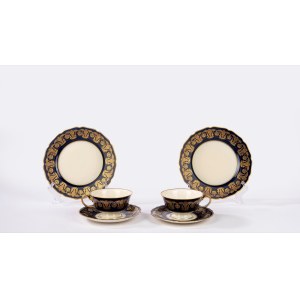 Two cups with saucers and two dessert plates, white porcelain with a blue and gold rim, Rosenthal, 20th century