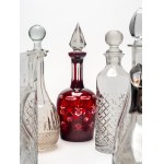 Lot consisting of five bottles, two carafes, and a crystal and glass pourer