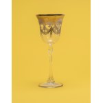 Clear glass bread basket with silver foil daisy inserts.