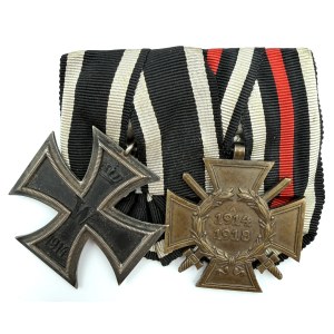 A BADGE WITH TWO WORLD WAR I DECORATIONS—THE IRON CROSS, 2ND CLASS, 1914, AND THE HINDENBURG CROSS WITH SWORDS