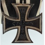 A BADGE WITH TWO WORLD WAR I DECORATIONS—THE IRON CROSS, 2ND CLASS, 1914, AND THE HINDENBURG CROSS WITH SWORDS
