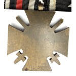 A BADGE WITH TWO WORLD WAR I DECORATIONS—THE IRON CROSS, 2ND CLASS, 1914, AND THE HINDENBURG CROSS WITH SWORDS