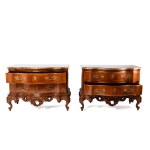 A pair of late Baroque chests of drawers