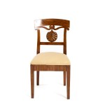 A pair of Empire-style chairs