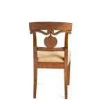 A pair of Empire-style chairs