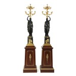 A pair of candelabras on pedestals in the Neo-Empire style