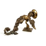 A wall sconce shaped like a winged satyr