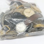 A set of disassembled watches and parts
