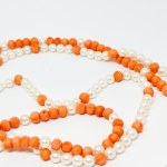 A one-of-a-kind gold necklace made of natural coral and Akoya pearls