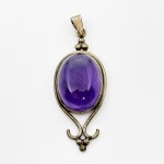 Silver pendant with a large amethyst cabochon