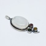 Silver pendant with a large moonstone, ruby, tourmaline, and citrine