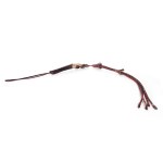 A whip with a hoof-shaped handle