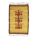 A kilim with a floral and bird motif