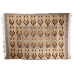 A kilim with a tulip motif, signed within the design: SPRLIA, “Wanda” in Krakow