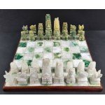 Stone chess set (white and green onyx or marble). Hawaiian Tiki or Mexican (Aztec/Mayan). 20th century.