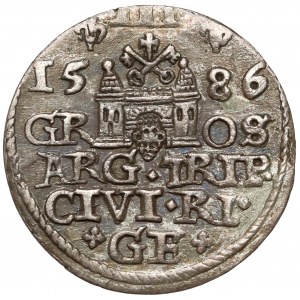 Stefan Batory, Trojak Ryga 1586 - duża głowa, rozetki