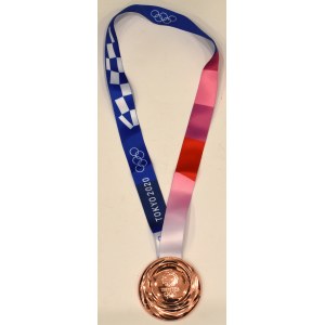 Replika medaily z olympijských hier v Tokiu
