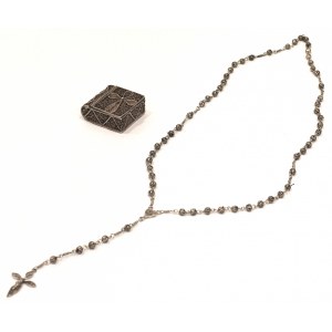 Silver rosary in filigree case