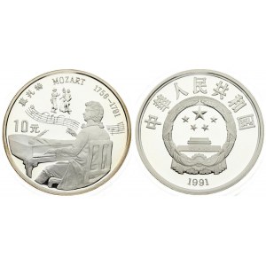 China 10 Yuan 1991. Averse: National emblem; date below. Reverse: Mozart seated at piano...