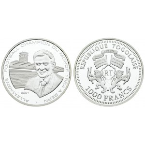 Togo 1000 Francs 2001 World Cup Soccer - Bern 1954. Averse: National arms. Reverse: Bust facing and tower...