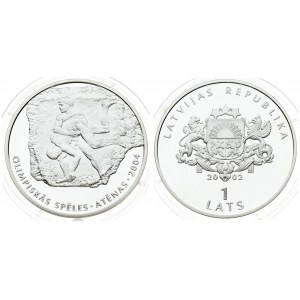 Latvia 1 Lats 2002 Olympics 2004. Averse: Arms with supporters. Reverse: Ancient wrestlers. Edge Lettering...