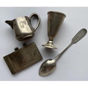 Silver teaspoon, Silver notebook lid, Stack and cream jug (not silver)