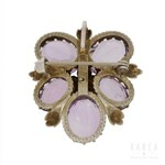A brooch/pendant modelled as a flower-head