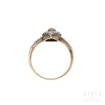 A navette shaped diamond paved ring