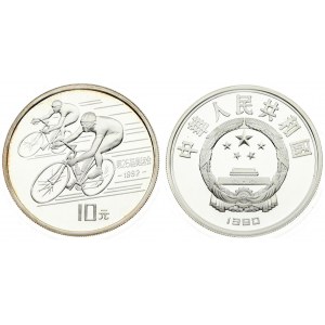 China 10 Yuan 1990 Averse: National emblem; date below. Reverse: Bicycle racers; denomination below. Silver...