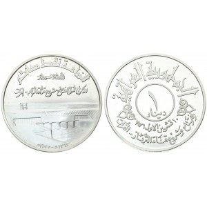 Iraq 1 Dinar 1977 Inauguaration of Tharthat-Euphrates Canal. Averse: Value within circle flanked by designs...